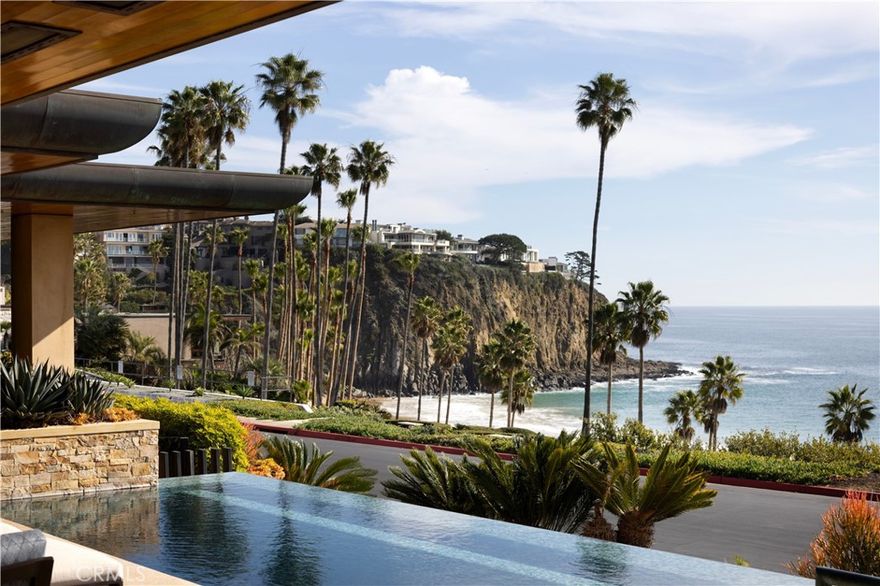 Set front row in Irvine Cove—Laguna Beach’s most exclusive and under-the-radar oceanfront community—2526 Riviera Drive is a rare architectural estate with panoramic views and total privacy. Designed by Leason Pomeroy, the home opens to the Pacific with walls of glass and a horizon-level infinity pool, blurring the line between indoors and out. Rich materials, custom built-ins, and sculptural elements elevate every space, while refined details like a Crestron automation system and an olive burl breakfast nook—with a pop-up TV and a vertical structure that continues elegantly to the level below—reflect the depth of design. The lower level offers a private lounge, game area, guest space, and flexible living—all connected by a custom floating staircase and elevator. An oversized garage completes the home’s rare blend of form, function, and front-row living. Homes in Irvine Cove rarely become available. Properties like this—almost never.