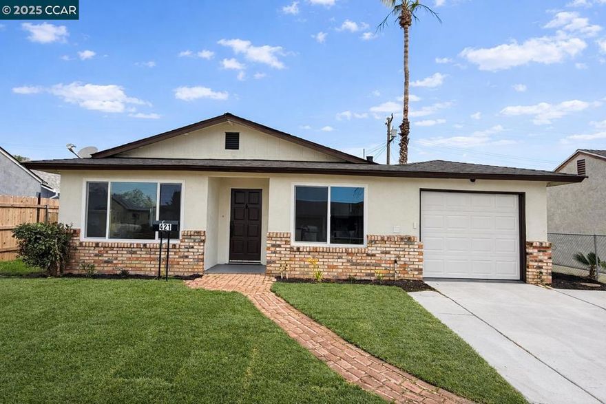 Beautifully renovated and move-in ready! This light-filled home features a fresh, modern interior with wide-plank flooring and updated lighting throughout. The gorgeous kitchen features new cabinets, sleek countertops, stainless steel appliances, gas range, and a functional layout ideal for everyday living and entertaining. 3 spacious bedrooms, cozy living room and eat-in kitchen, remodeled bathroom, large backyard and so much more! A great opportunity for buyers looking for a turnkey home with a refreshed and inviting space!