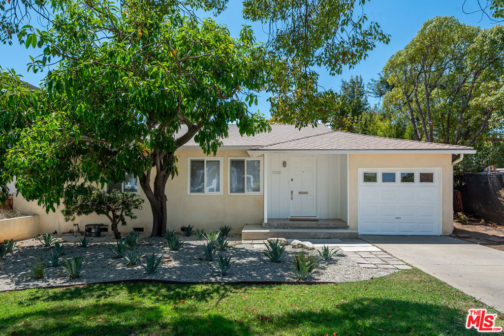 Welcome to this inviting 3-bedroom, 2-bathroom home located in the heart of Palms, just one block south of Clover Avenue Elementary School. Thoughtfully designed for comfort and convenience, this home combines classic charm with modern updates. Inside, you'll find hardwood floors throughout, a Great Room including a bright and functional kitchen with stainless steel appliances, including a Viking stove, and comfortable living/dining areas. Enjoy the ease of in-home laundry with a washer and dryer included. The layout offers three well-proportioned bedrooms and two full bathrooms, perfect for both daily living and entertaining. Step outside and enjoy the generous outdoor space, ideal for dining al fresco, hosting friends, or simply relaxing in the California sunshine. A one-car garage and driveway provide off-street parking and extra storage. Situated in a highly desirable neighborhood with tree-lined streets, this home offers easy access to schools, parks, shops, and the best of Westside living.
