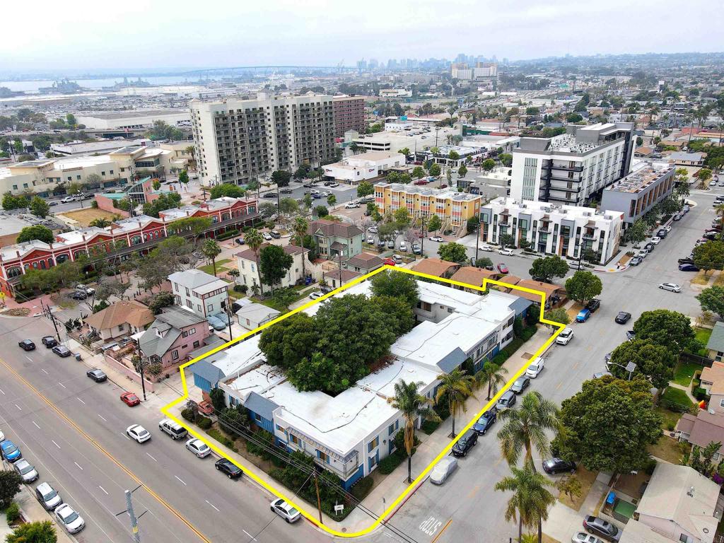 930 B Ave National City, "The French Quarters" presents the opportunity to acquire a rarely traded 27 unit garden style asset located in National City’s most desirable corridor. The property is located one parcel away from the Historical Landmarks of Brick Row & Heritage Square and within a 3 minute walk of all the activity Kimball Park, E 8th St, and National City Blvd have to offer. The asset possesses both attractive immediate value-add potential on the existing 27 units and significant development potential. The parcel consists of 23,086 SF within the Downtown Specific Plan allowing for 3:1 & 4:1 FAR ratios of multifamily development. 930 B Ave consists of 25 registered units and 2 unregistered units. The unit mix contains (10) 1 Bed / 1 Bath units, (10) 2 Bed / 1 Bath units, (5) 2 Bed / 2 Bath units, and the (2) unregistered studio units converted out of existing non-living square footage. The property possesses an oversized unit average of 765 SF with a huge 5,549 SF of additional existing non-living square footage comprised of 23 garages, 4 storage rooms, the 2 unregistered studio units, and an on-site laundry facility. An investor can pursue a lower intensity value-add play or an all-out full rebuild including major infrastructure systems at a forecasted 8.13% proforma cap rate and 6.10% all in Yield on Cost. Additional return can be gained through ADU development of select garages and storage rooms. All garages adjoin to the interior courtyard. There are no units on the 1st floor of the Western or Northern portion of the property, allowing for ideal ADU garage conversions with potential front door courtyard access. 15 of the 27 units are in renovation ready status allowing for immediate renovations and improvements. The majority of units are in mostly original condition with partial updates. Roughly half of the units could be in attractive market operating condition with minor improvements. The remaining units should receive full renovations to maximize ROI. Existing ownership completed a full roof and underlay replacement in 2024. Electrical and plumbing systems are original from 1971.