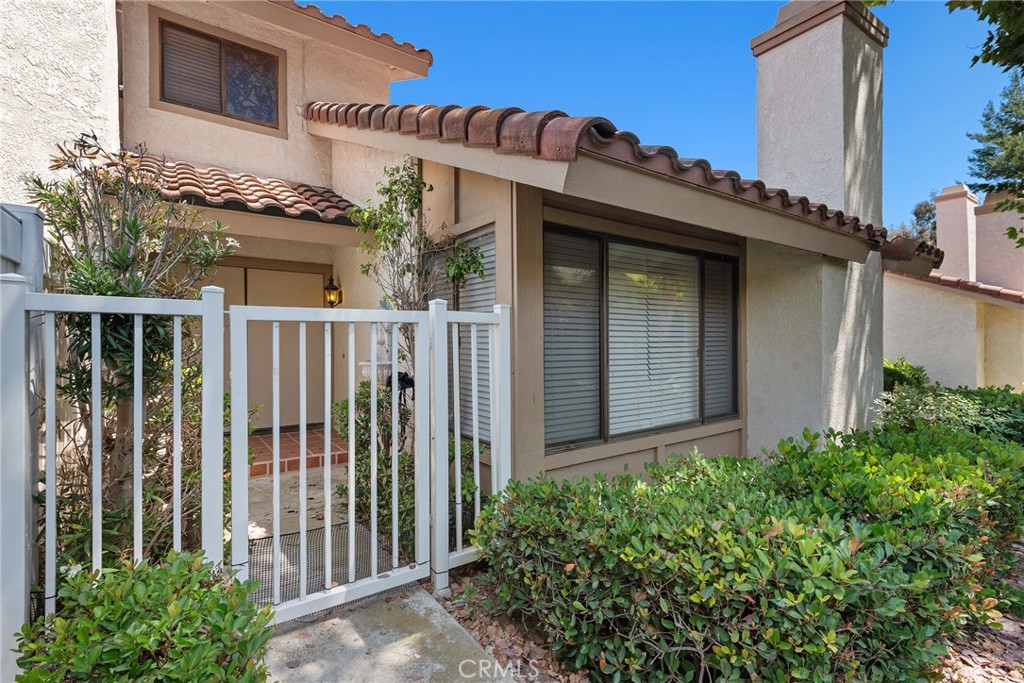Beautiful townhome located at a lush and well maintained and quiet community of Montefino, and it is a good opportunity for families looking for the Walnut Valley Unified School District. This is a 2-story layout, gated entry, double doors, and no immediate neighbors in the front. You will feel very comfortable in the spacious living room and formal dining room featuring vaulted ceilings giving you an open feeling. This home offers a remodeled kitchen, newer flooring, upgraded plumbing, attached 2-car garage, and a private yard. The master bedroom features a walk-in closet, two sinks, lots of counter space, and a private balcony. HOA includes water, trash, fire insurance, landscaping, and night patrol. An easy walk to community pools, shopping centers, grocery stores, and local restaurants. Located near the 57 & 60 freeways. Don't miss this opportunity to own your home!