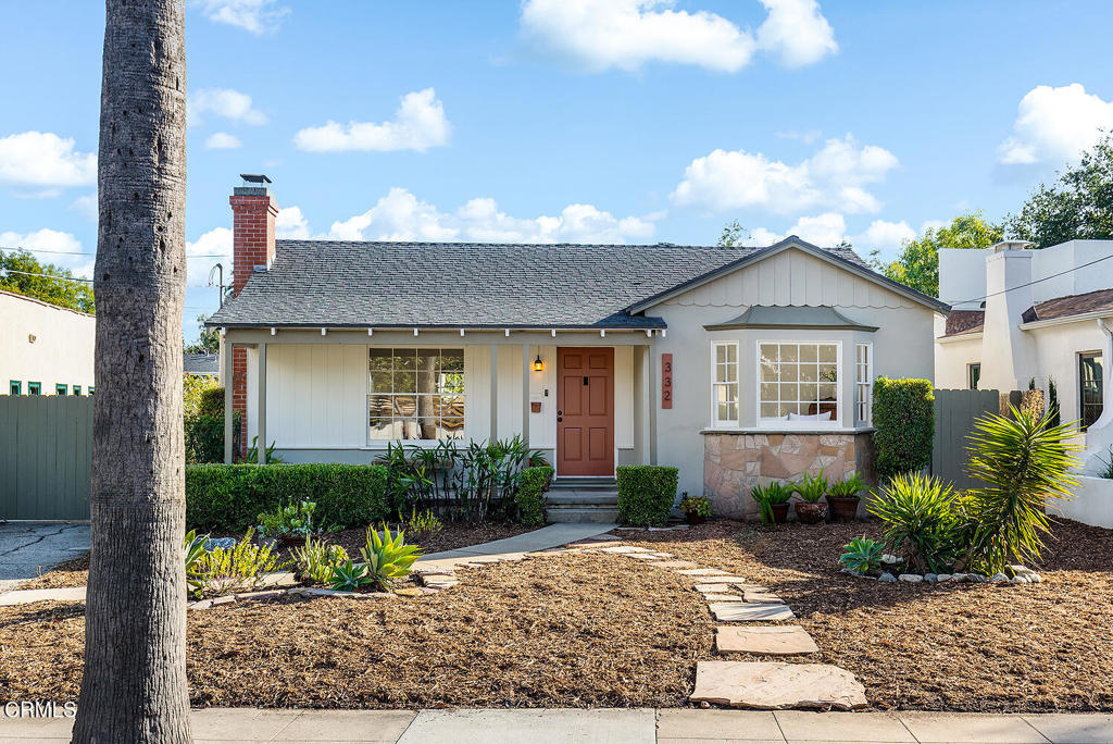 Curb appeal, character and a big back yard! This 1940s traditional in Pasadena's Muir Heights neighborhood has had only 2 owners and retains so much charm -- original hardwood floors, cerulean blue glazed tilework in the full bath and handsome decorative stacked brick fireplace in the living room. Welcoming from the street, the covered front porch is a dream spot to take in peekaboo mountain and neighborhood views. Refreshed with new paint inside and out, the floorplan here enjoys bedrooms on the west side of the home, with public spaces to the east. Two light-filled bedrooms are well proportioned, with linen storage in the hallway between and a windowed full bath with separate tub and shower - what a win! A sunny living room with large picture window flows into the dining room, also rich in natural light, leading into the happy kitchen with handsome 1940s curved-edge cabinetry and colorful tilework. Light fixtures here are everything - vintage afficionados will love the original fixtures throughout (from the reeded glass on the north bedroom ceiling, to the sculptural jewel-toned chandelier in the dining room, to the milk glass sconce above the kitchen sink - all are so great. Lastly, the convenient laundry/mud room is located just off the kitchen with backyard access - what a win. Situated on a large lot offering great curb appeal and welcoming outdoor spaces, the property lends itself to urban farming, potential expansion or an ADU build. This fantastic location is convenient to freeways and transportation, and moments from HomeState, Highlight Coffee, Kismet, Good Neighbor Bar and all the hip spots on the Lincoln corridor. With an expansive backyard boasting numerous full grown citrus trees (including lemon, lime, and tangerine) large entertaining patio, carport and 365 SF finished two car garage, this property offers the ideal balance of quiet neighborhood living with all the convenience of the city.