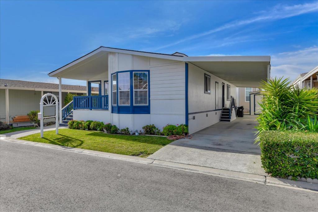 Senior living at its best in this 5 star community and spacious,beautiful home. This popular floor plan includes an extra large guest room with a walk-in closet.The Master suite includes his and hers closets,ceiling fan,dual sinks, soaking tub,skylight,and a large shower stall. Gourmet kitchen is exciting with an island, tons of corian-like counter tops,storage galore and lot of roll-outs shelves. There is a skylight and breakfast nook here too! Exterior wise,low maintain yard, large matching shed, 3 car carport and extended carport awning.Roomy laundry room has lots of storage and a wet sink... Get on board...Your'e gonna love where you live