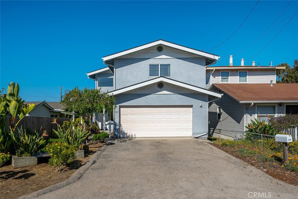 Welcome to your coastal retreat in beautiful Morro Bay. Ideally located just minutes from local dining, shopping, and the beach, this light-filled home offers ocean views, thoughtful updates, and a peaceful neighborhood setting. It is perfect for full-time living, a vacation home, or a weekend escape. The upper level features a spacious primary suite with a Jack and Jill bathroom, along with a large, light-filled living room and dining area. The newly renovated kitchen boasts brand-new countertops and flooring, seamlessly connecting to the main living spaces and bringing in abundant natural light. Downstairs, you’ll find two comfortable bedrooms, a full bathroom, and a versatile sunroom that opens directly to the private backyard. Whether used as a home office, creative studio, or quiet retreat, the sunroom adds valuable flexibility to the layout. A two-car garage offers plenty of storage and everyday convenience. This move-in-ready home combines comfort, location, and ocean views in one inviting package. Come experience the best of coastal living in Morro Bay and make this home your own.