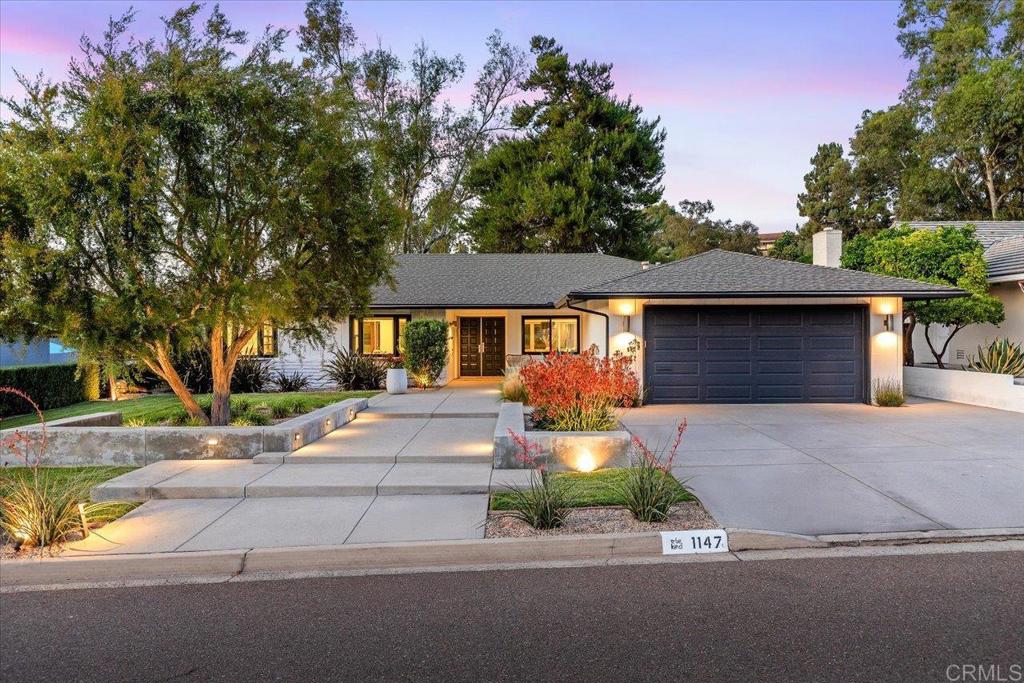 Welcome to 1157 San Pablo Drive — a rare chance to own a home in one of the most scenic spots in Lake San Marcos. Sitting right on The Links at Lakehouse championship golf course, this single-story home offers front-row views of the fairway and the kind of peaceful setting that’s hard to find. Thoughtfully redesigned with a modern aesthetic this 3-bedroom, 2-bath home features an open-concept layout filled with natural light, wide-plank luxury vinyl flooring, and high-end finishes throughout. The chef’s kitchen boasts sleek quartz countertops, custom soft-close cabinetry, designer tile backsplash, and stainless steel appliances—perfect for everyday living or entertaining. Both bathrooms have been fully updated with contemporary fixtures and elegant tile work. Step outside to a spacious covered outdoor room overlooking the golf course—ideal for relaxing, hosting, or simply enjoying the serene setting. This home blends style, comfort, and resort-style living all in one beautifully curated package. Nestled in the prestigious Lake San Marcos community, residents enjoy two championship golf courses, a recreational lake with water activities, and award-winning dining—all just a short golf cart ride away. Conveniently located near top-rated schools, premier shopping, entertainment, and scenic hiking trails, this extraordinary residence offers an unparalleled blend of luxury, lifestyle, and location. Welcome to your dream home—where every day feels like a vacation.
