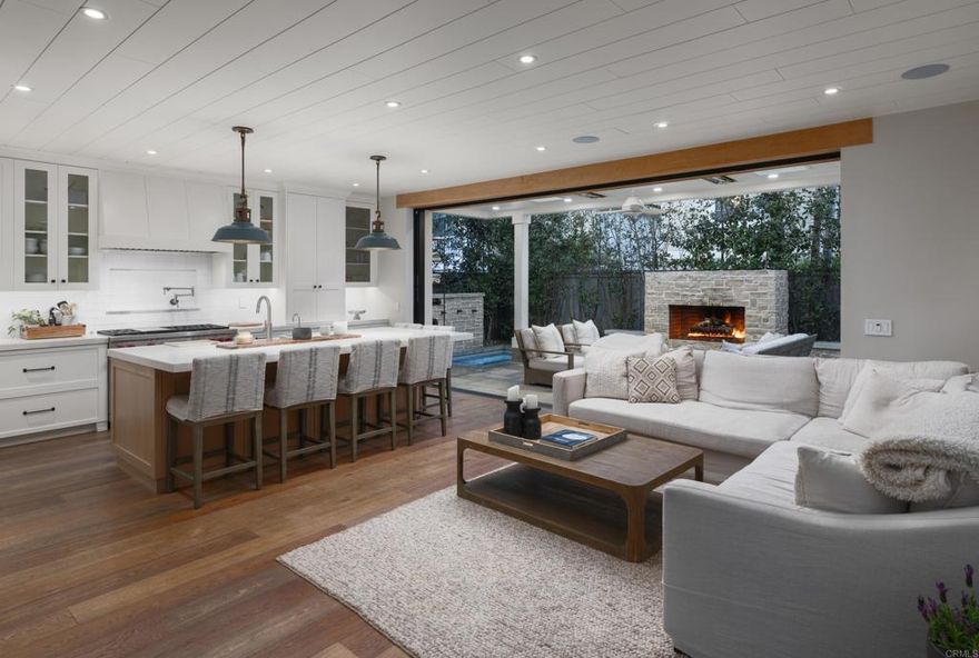 Beautifully renovated and completely turn-key, this modern coastal craftsman offers 3 bedrooms in one of Carlsbad’s most sought-after beachside communities. Just one block from Carlsbad State Beach, this light-filled retreat combines timeless style with contemporary upgrades and exceptional indoor/outdoor living. Hardwood floors enhance the open floor plan throughout, custom cabinetry, a chef’s kitchen with Wolf appliances, and seamless access to the backyard oasis. Perfect for entertaining, the outdoor space boasts a fireplace, built-in BBQ, spa, turf, shower, surfboard locker, and a dedicated cold plunge and sauna for wellness enthusiasts. The expanded primary suite offers a luxurious escape with a custom walk-in closet and spa-inspired bath featuring a steam shower. Additional highlights include a laundry chute, whole-home sound wiring, and thoughtful upgrades throughout. With award-winning Carlsbad schools, top-rated dining nearby, and the beach just steps away, this home presents a rare opportunity to enjoy the very best of coastal living.