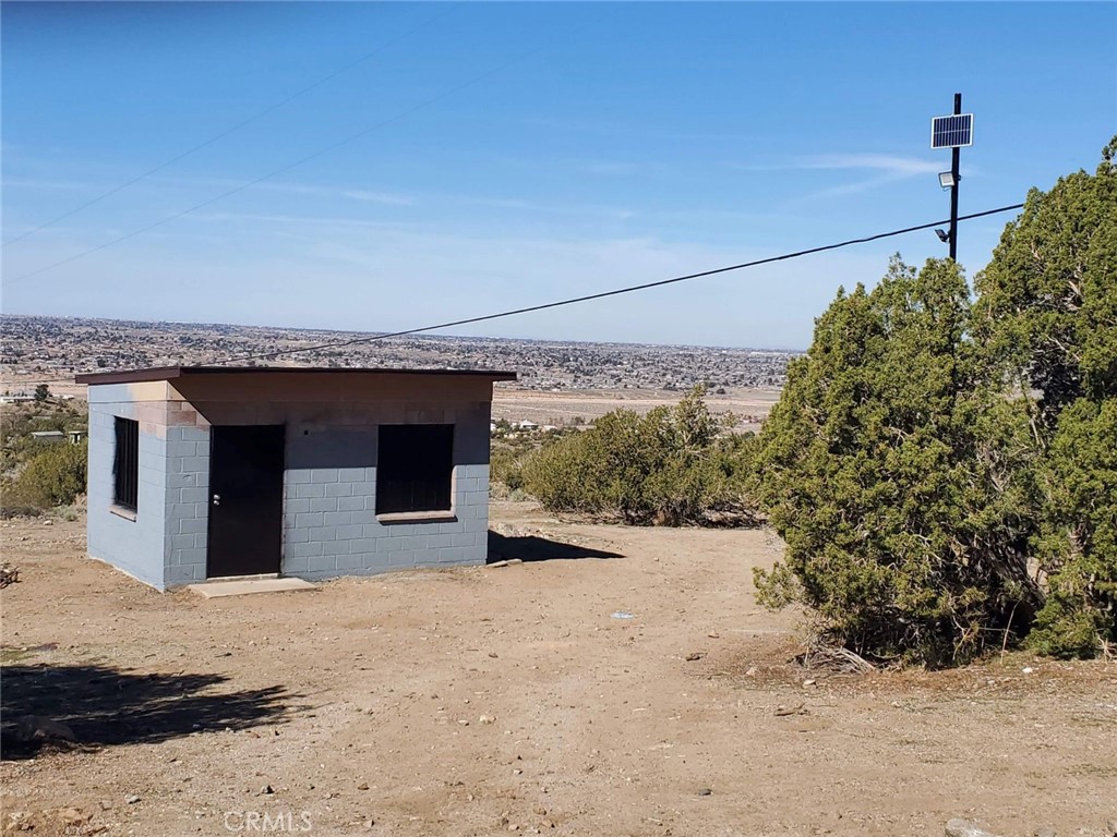 Opportunity awaits for this approximate 2 acres lot of usable space with storage included and already fence.