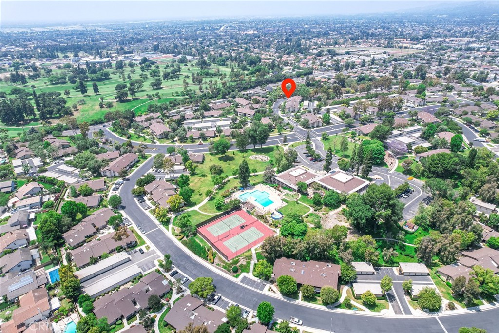 Welcome to "LA MIRADA LANDMARK" - EXCLUSIVE COMMUNITY FOR 55+ ACTIVE ADULTS ** Highly Desirable GROUND LEVEL - Bright End Unit 2 Bed, 2 Bath + ENCLOSED PATIO For Additional Space (currently used as Crafts/Sewing Room) ** NEWER UPGRADES INCLUDE - Totally Remodeled 2 Bathrooms - New Tub, Shower, Vanity, Light Fixtures, Luxury Vinyl Plank Flooring, Smooth Ceilings Throughout (No Popcorn Ceiling), Spacious Living Room w/Recessed Lighting, Ceiling Lights In Bedrooms & Dining Area, Quartz Counter Top In Kitchen, Window Blinds ** All Bedrooms w/Sliding Mirrored Closet Doors .. Primary Bedroom has 2 Closets ** Detached 1-Car Garage w/Auto Opener - Located Closest to the Unit ** Plenty of Parking for Guests & Residents ** HOA Installed NEW ROOF in July 2024 .. HOA Amenities & Activities Include - Pools, Spa, Tennis Courts, Wood Shop, Crafts, Library, Recreation Room ** HOA Dues Include Water & Trash ** Great Location Near La Mirada Golf Course & Community Park, Local Shopping & Restaurants