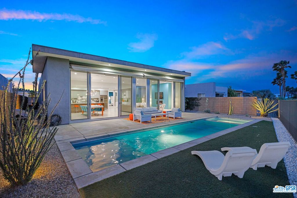 *** Monthly Rates: November - April: $12,000. May to October: Call for pricing. Availability: Now through the rest of the 2025/2026 Season. *** Indulge in the epitome of luxury in the heart of Palm Springs. Envision your ideal retreat, overlooking the breathtaking scenery of Escena Golf Club's 18th fairway. This sophisticated oasis embraces contemporary refinement, offering a generous 2,517 sq ft open floor plan with three bedrooms and three bathrooms, showcasing chic interior design reminiscent of the perfect blend between Elle Decor and Dwell Magazine. Elevate your living experience with sliding glass doors that grace both the living and dining areas, seamlessly connecting you with the great outdoors. Revel in the fresh, revitalizing air as you witness awe-inspiring sunsets. Alternatively, entertain indoors within the unique island-style kitchen, complete with soaring ceilings that infuse an air of grandeur into this modern sanctuary. Indulge in serene evenings within the private en-suite courtyard, designed for tranquility with plush seating encircling a welcoming firepit, ideal for stargazing beneath the shimmering Palm Springs skies. Pamper yourself in the spa-like master bath, boasting dual vanities, quartz counters, a beautifully tiled walk-in shower, and two closets, offering pure indulgence at every corner. This sun-drenched modernist abode is perfectly situated to explore all that Palm Springs has to offer. The two guest bedrooms provide ample privacy from the master suite. Additionally, you'll find convenience in the nearby Escena dog parks or enjoy an unforgettable evening at the Golf Club Lounge & Grill. Discover the pinnacle of refined living at Escena Golf Club. Make your reservation today and savor the essence of luxury in beautiful Palm Springs.