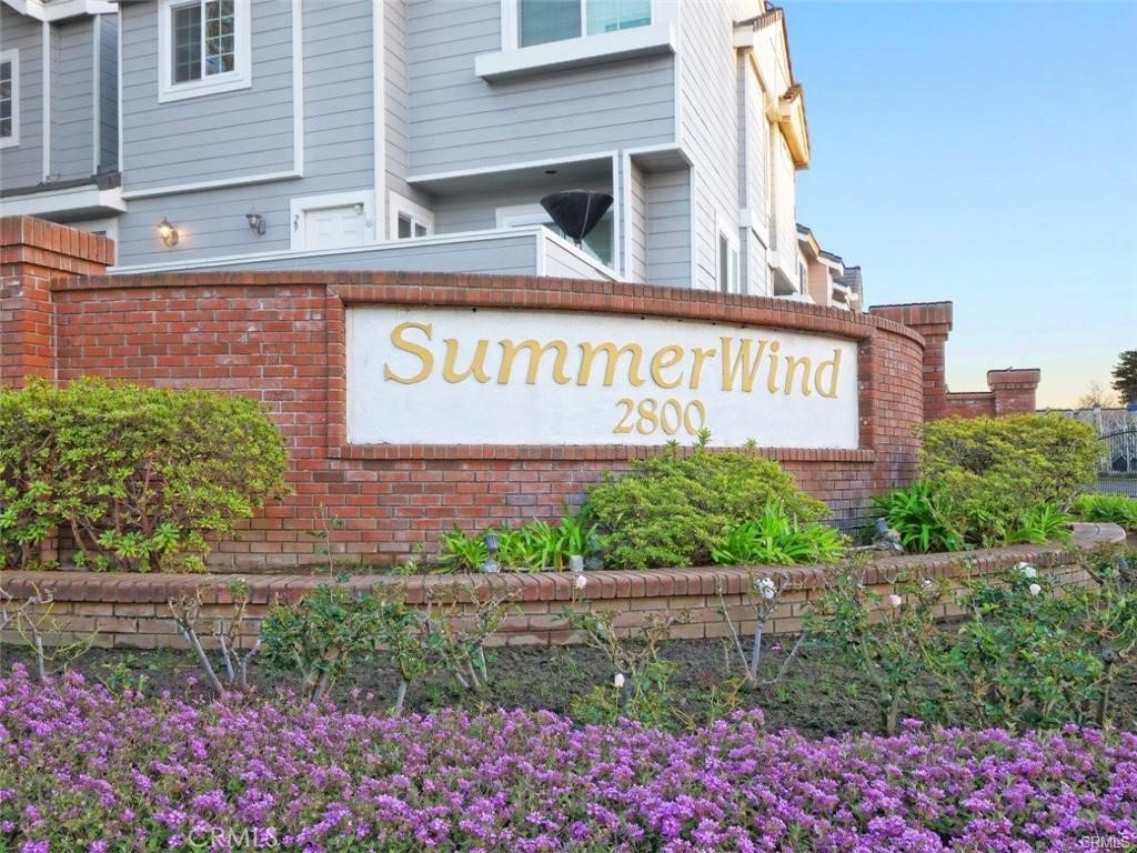Beautiful townhome located in the desirable Summerwind gated community, conveniently located near the front entrance for easy access. This home has been constantly remodeled & updated with newer paint, wood floor, shutters/blinds, granite countertops, A/C, and a garage door. With one side facing the open space, this townhome is flooded with natural light that shines through the house. The inviting living room features recessed lights and a sliding door that opens to a spacious patio for BBQ or entertaining. The kitchen offers granite countertops, newer appliances, and seamlessly flows to the bright dining area. In addition, there is a powder room for easy access. ON THE UPPER LEVEL are 2 primary en-suites, both with vaulted ceilings & large/walk-in closets. The en-suite bathroom in each suite has a separate vanity and enclosed toilet/bath area. This home also includes a dedicated laundry area and a versatile bonus room, perfect for storage, a home office, a gym, or whatever suits your needs. Meanwhile, the attached two-car garage offers direct access to the home. The sought-after Summerwind community offers 3 pools, 3 spas, a large clubhouse for events, a playground, and an appealing gated entry. There is plenty of guest parking nearby, and the unit is close to the clubhouse and 2 pools. This beautiful home is centrally located in the award-winning Torrance School District, close to Wilson Park and its weekly farmers market, Del Amo Shopping Mall, and many local restaurants to enjoy, not to mention that it is only 10 minutes to the Beach. A must-see gem in a prime location!