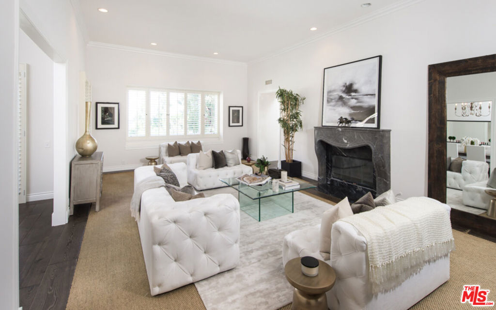 Spectacular top-floor corner condominium in the luxury complex of Le Parc in prime Century City. This 2 bed 3.5-bath unit has many upgrades. This unit has an impressive entry with 12-foot ceilings, that leads to an open living room, dining room and a den with wet bar that is great for entertaining. The gourmet kitchen with granite counter tops and breakfast area opens to a beautiful terrace with expansive views. The master bedroom includes a large walk-in closet and dual updated baths. The complex features 24-hour gated security, beautifully landscaped scenery, guest parking, a pool, a gym, and tennis courts. There is an extra storage space and 2 side-by-side reserved parking spaces in the subterranean garage.