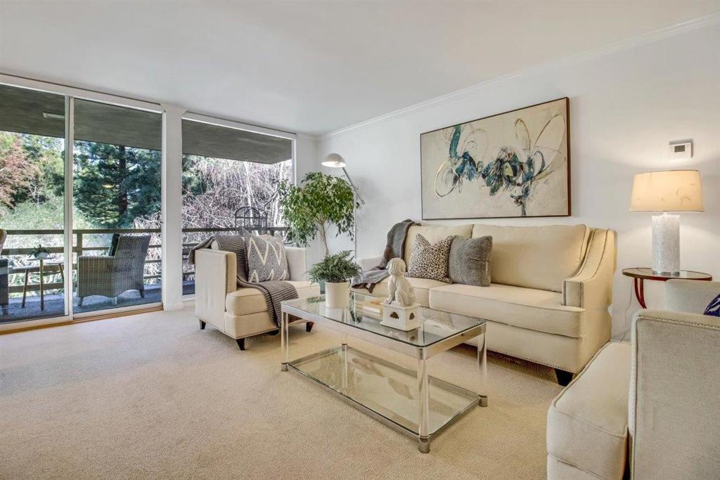 Located in a gated area in Sharon Heights, this stunning 3 bedroom,2 bath condominium has peaceful wooded views most of the windows of this unit. The kitchen and bathrooms have been subtlely and tastefully remodeled. There is a combination of hardwood flooring and carpet throughout the unit. All of this makes for a spacious comfortable retreat in the middle of a busy community. The complex offers a pool, and beautiful common area spaces. It is conveniently located near freeways, shopping, and a park. This is a wonderful place to call home. Don't miss this wonderful opportunity.