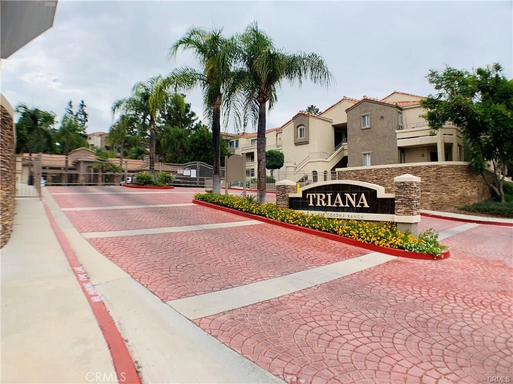 BEAUTIFUL TRIANA CONDO GATED COMMUNITY AT CORONA RANCH. THIS IS THE LARGER VERONA MODEL WITH 2 MASTER SUITES COMPLETELY SEPARATED FOR PRIVACY WITH WALK IN CLOSETS AND THEIR OWN SEPARATE BALCONIES. YOU CAN ACCESS BALCONY THROUGH THE LIVING ROOM WHICH HAS CATHEDRAL CEILINGS WITH CROWN MOLDING. FULLY UPGRADED COMES WITH STAINLESS STEEL APPLIANCES: MICROWAVE, STOVE & DISHWASHER, REFRIGERATOR & WASHER DRYER INSIDE THE UNIT. BATHROOMS REMODELED IN OCT 2022 WITH BRAND NEW TOILETS AND TILED WALLS IN THE SHOWER WITH LARGE BATHTUBS IN BOTH BATHROOMS. NEWER CARPET AND BLINDS. ENJOY COMMUNITY POOL, SPA, GYM AND CLUB HOUSE WITH FULL KITCHEN AND ACCESS TO POOL FOR PARTIES. WALKING DISTANCE TO HIGHLY RATED MCKINLEY ELEMENTARY SCHOOL. CLOSE TO SHOPPING, FREEWAYS ( 15 & 91). THIS IS A 2 LEVEL BUILDING AND THIS UNIT IS ON THE 2ND LEVEL. AS YOU CLIMB DOWN THE STAIRS, ONE CAR EXTRA LONG GARAGE IS ON THE RIGHT HAND SIDE FOR YOUR CAR, OR STORAGE NEEDS. A MID SIZE SUV CAN FIT VERY NICELY IN THE GARAGE WITH A LOT OF ROOM TO SPARE FOR STORAGE. UNIT IS PRICED RIGHT AND WILL MOVE FAST. WATER & TRASH ARE COVERED UNDER RENT, RENTER JUST PAYS FOR ELECTRICITY.