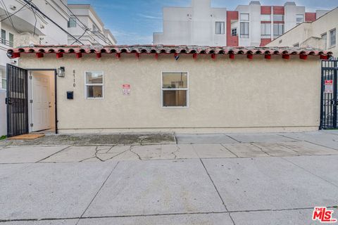 Photo of 8710 S Chalmers Street, Los Angeles, CA 90035 (MLS # 26658405)