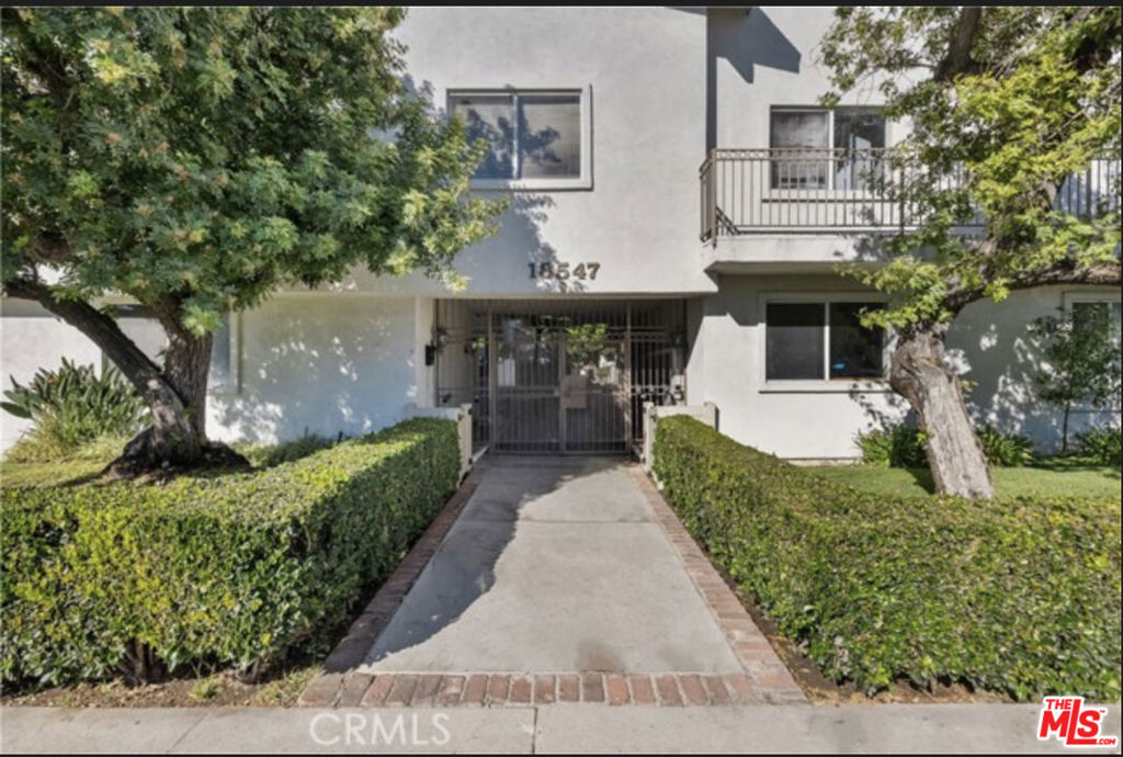 This spacious and stylish 2-bedroom, 2-bathroom unit is located within a secured gated complex. The unit is cash flowing and income producing, currently Tenant occupied. This unit is on the ground floor and offers one of the largest enclosed and gated patios. Ideally located directly across from one of the complex 3 swimming pools and spas. Featuring easy to maintain wood look laminate flooring throughout and an open designed kitchen with granite countertops and lots of cabinetry. The primary bedroom has an ensuite bathroom. In addition to one assigned covered parking, there's a separate car tag that allows for open parking within a gated lot. HOA dues conveniently include water, basic cable and internet, 2 parking spaces, and common areas ground maintenance. The well-maintained community offers fantastic amenities, including three swimming pools, three spas, a clubhouse, playgrounds, and shared laundry facilities. Ideally situated within a short distance to Ventura Boulevard's vibrant dining, shopping, and coffee spots, and with easy access to the 101 freeway. Please do not disturb, do not speak to the occupants. Photos were taken before Tenant move-in.