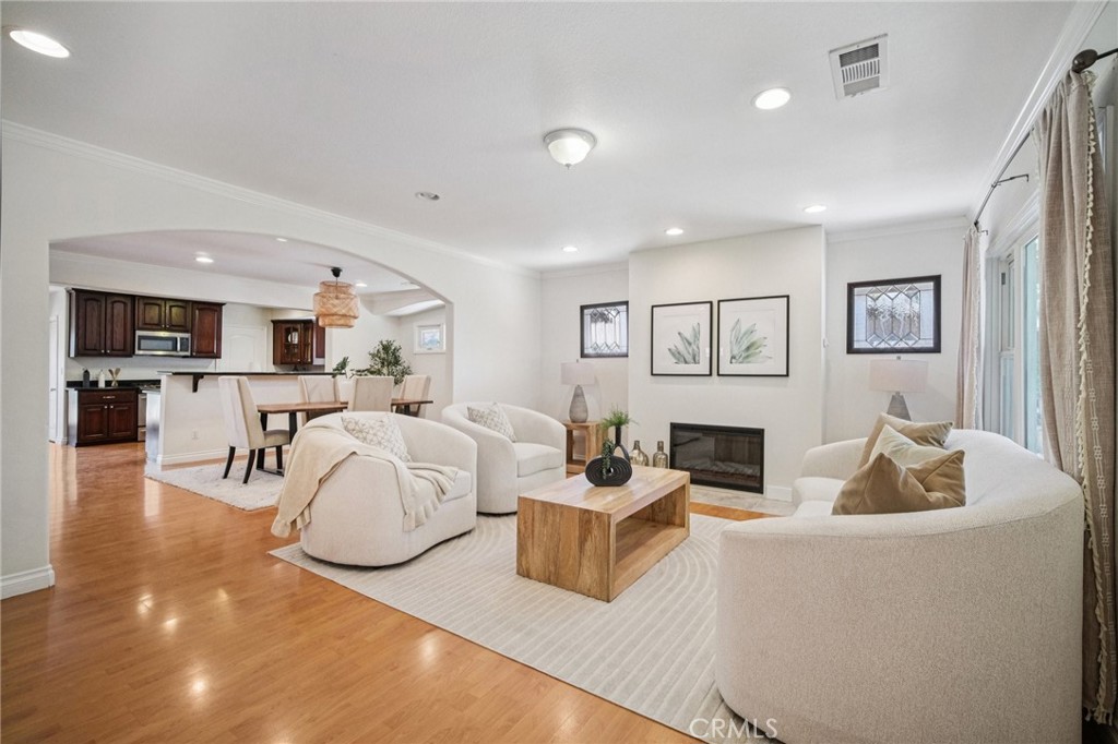 Welcome to this beautiful 1912 home, perfectly set on a picturesque, tree-lined street in the heart of Historic Pasadena. Blending timeless character with modern updates, this residence offers a warm and inviting atmosphere ideal for today’s lifestyle. Inside, you’ll find a thoughtfully designed floor plan filled with natural light. The home features 3 bedrooms and 1.5 updated baths, plus a versatile bonus room located behind the garage—perfect for a home office, studio, or guest space. The open-concept layout connects the kitchen, dining, and living areas, enhanced with recessed lighting for a bright ambiance. The kitchen is equipped with stainless steel appliances, granite countertops, a breakfast bar, and abundant cabinetry. Additional updates include renovated bathrooms, a newer water heater, and central heating and air conditioning, making this home truly move-in ready. Step outside to enjoy the expansive backyard with a lush lawn, spacious deck, and mature trees—ideal for family play, outdoor dining, or entertaining friends. Other highlights include: an oversized 2-car garage, solar panels, long driveway, and plenty of natural light throughout. Conveniently located near Pasadena’s finest dining and shopping, including Old Town, The Rose Bowl, The Playhouse District, and The Roma Market, as well as parks, entertainment, and the 210 freeway. This charming Pasadena gem seamlessly combines historic charm with modern comfort—move-in ready and a MUST SEE!