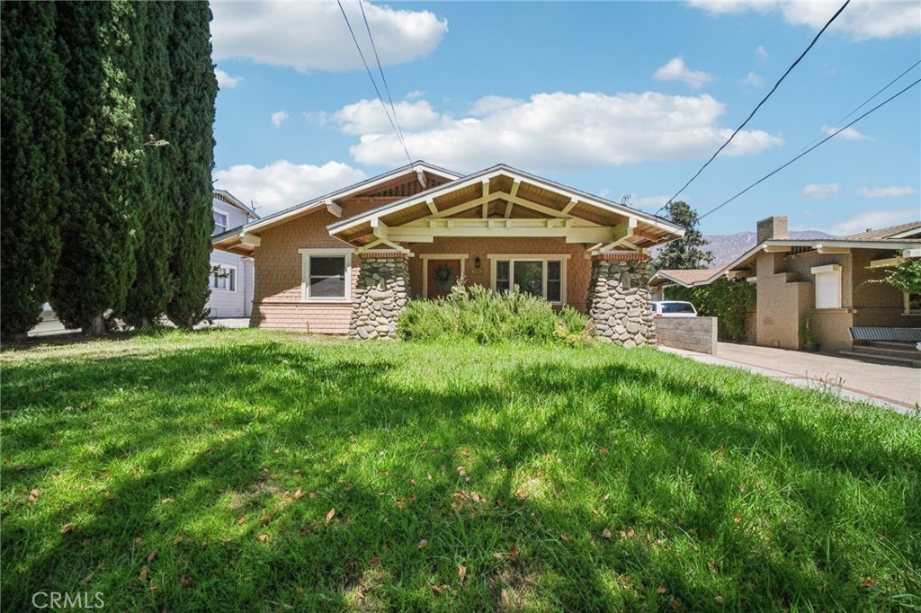 Welcome to this beautiful 1912 home, perfectly set on a picturesque, tree-lined street in the heart of Historic Pasadena. Blending timeless character with modern updates, this residence offers a warm and inviting atmosphere ideal for today’s lifestyle. Inside, you’ll find a thoughtfully designed floor plan filled with natural light. The home features 3 bedrooms and 1.5 updated baths, plus a versatile bonus room located behind the garage—perfect for a home office, studio, or guest space. The open-concept layout connects the kitchen, dining, and living areas, enhanced with recessed lighting for a bright ambiance. The kitchen is equipped with stainless steel appliances, granite countertops, a breakfast bar, and abundant cabinetry. Additional updates include renovated bathrooms, a newer water heater, and central heating and air conditioning, making this home truly move-in ready. Step outside to enjoy the expansive backyard with a lush lawn, spacious deck, and mature trees—ideal for family play, outdoor dining, or entertaining friends. Other highlights include: an oversized 2-car garage, solar panels, long driveway, and plenty of natural light throughout. Conveniently located near Pasadena’s finest dining and shopping, including Old Town, The Rose Bowl, The Playhouse District, and The Roma Market, as well as parks, entertainment, and the 210 freeway. This charming Pasadena gem seamlessly combines historic charm with modern comfort—move-in ready and a MUST SEE!