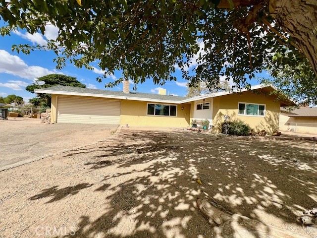 Discover this inviting and thoughtfully updated 3-bedroom, 2-bathroom family home in a prime Hesperia location- on the Mesa. Designed for comfortable living, the functional layout flows effortlessly from a bright ample living room with cozy fireplace to a completely remodeled kitchen and spacious bedrooms creating a welcoming space for guests and preserving privacy for the family. It's Move-In Ready with a host of recent upgrades: new flooring, upgraded bathrooms, new kitchen cabinets with lazy Susan corner cabinet, new granite counter tops, brand new matching Whirlpool appliances- refrigerator, stove with microwave, dishwasher, recessed kitchen lighting, new energy efficient windows throughout the entire home, new energy efficient central a/c, new smart thermostat for remote climate control, and new water heater. This home sits on almost half an acre with spacious front and rear yards, long driveway and plenty of extra space for your RV, boats, or other weekend toys. Located in a desirable location near golf course, shops, and. restaurants. This home is move-in ready and for an even smoother move-in, may come partially furnished.