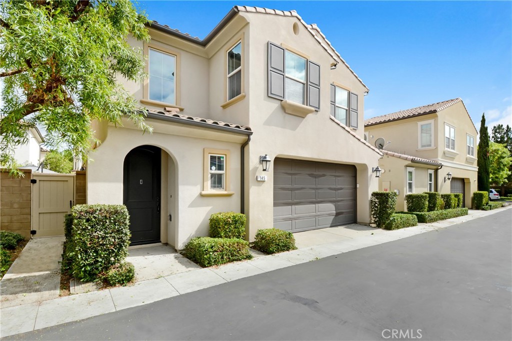 Welcome to 145 Bright Poppy, located in Irvine's highly sought-after Portola Springs community. This beautiful 3-bedroom, 2.5-bathroom home offers 1,734 sq. ft. of comfortable living space with a bright, open layout and contemporary finishes throughout.
The main level features easy-to-maintain tile flooring, high ceilings, and a spacious living area that flows seamlessly into the modern kitchen. The kitchen is equipped with a large center island, granite countertops, stainless steel appliances, and ample cabinetry perfect for both everyday living and entertaining. A private patio just off the living room provides the ideal outdoor retreat.
Upstairs, you'll find three well-sized bedrooms and a convenient tech area. The primary suite includes a walk-in closet and a spa-inspired bathroom with dual vanities, a soaking tub, and a separate shower. Wood flooring extends through all bedrooms for a warm, clean finish.
Additional features include a two-car garage, washer, dryer, and refrigerator included, and access to Portola Springs' resort-style amenities pools, spas, parks, tennis and basketball courts, clubhouses, and scenic trails. Enjoy award-winning Irvine schools and a location close to the Great Park, Woodbury Town Center, and major freeways.