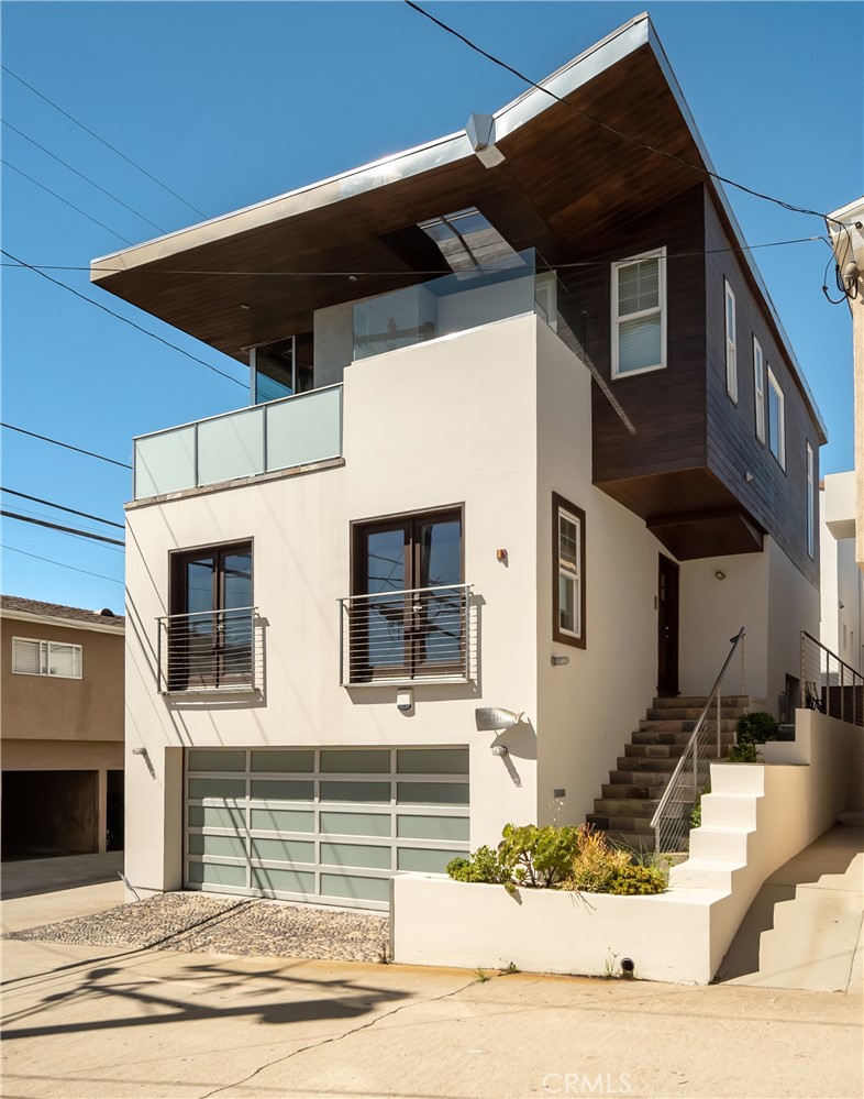 Enjoy Panoramic Ocean Views from Malibu to Catalina from this luxurious three (or four!) bedroom home just three blocks from the beach and within easy walking distance of everything! Gourmet kitchen with stainless steel appliances including 100+ bottle wine refrigerator, a professional 6-burner Thermador stove & double oven, stainless refrigerator & Bosch dishwasher. Natural light fills the open floor plan from the floor to ceiling Fleetwood Doors. Fireplaces in the Family Room and Master Bedroom. Jacuzzi on the 3rd floor deck, Air Conditioning.
The house also has a 365 sf office/guest quarters (included in total sf) with a separate entrance off Crest Drive - call listing agent for details