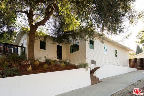 Photo of 1037 N Avenue 50 Ave, Los Angeles, CA 90042 (MLS # 25601405)
