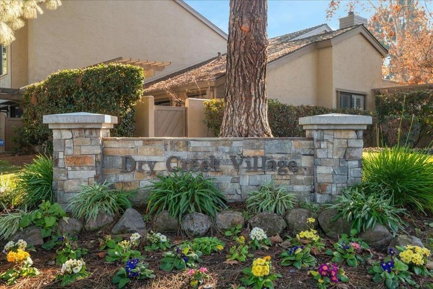 Feast your eyes on this beautiful townhome, in the distinguished Dry Creek Village! Featuring 1,954 SF, three bedrooms and two full bathrooms upstairs, including a huge primary suite with a generous walk-in closet, and located on the pool-side of the development.  Downstairs includes a versatile den/office, in addition to the three bedrooms, ideal for working from home, along with a convenient half bath. The kitchen features white cabinetry and stainless steel appliances, opening to the main living area highlighted by Brazilian cherrywood flooring throughout the lower level. Plantation shutters to top it off.  A private back patio overlooks a serene greenbelt, providing a peaceful setting to unwind and enjoy the surroundings. Residents of Dry Creek Village enjoy community amenities including a pool, tennis court, bocce ball, pickleball, and clubhouse.  Located just minutes from Downtown Willow Glen with easy access to Highways 17, 280, and 87.