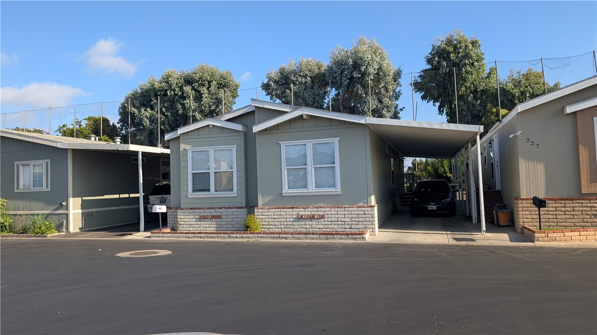 Welcome to 3434 W Washington Ave, Space 228 – a spacious 4-bedroom, 2-bathroom mobile home located in the desirable Holiday Mobile Home Estates, a well-maintained and gated community in the heart of Santa Ana. This charming home offers a functional layout ideal for families or those needing extra space. Enjoy the convenience of being close to local restaurants, shopping centers, schools, and with easy access to the 5 and 22 freeways for commuting.