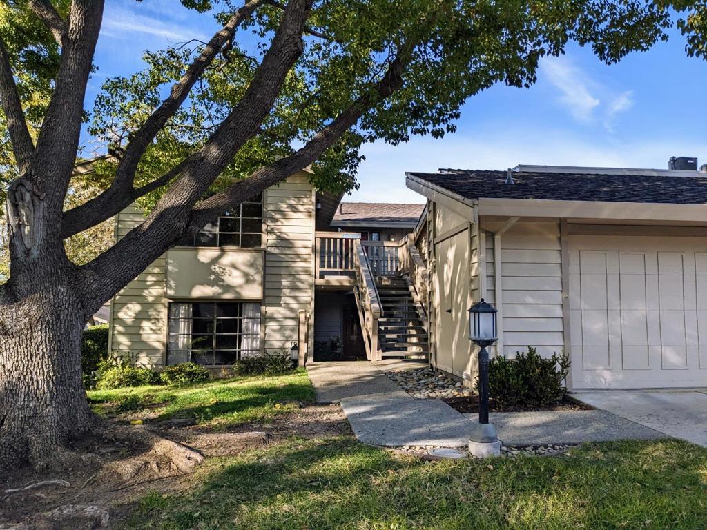 Stunning View of Lake and Hills from the Upper Level End Unit in Active Senior Community*1 Person to be 55+*Just Remodeled*Living Room Features Vaulted Ceiling and Cozy Fireplace*Kitchen Features New Cabinets, Counters, Under-Cabinet Lighting, Sink, Faucet, Glass Tile Backsplash, Built-in Microwave, Recessed Lighting*Large Breakfast Nook off Kitchen could also be Family room*Access to Rear Balcony from Breakfast Nook, Dining Room and Living Room*Alcove off Primary Bedroom is Perfect for Reading or Working -- Enjoy the Fabulous View!*Dual Sinks and Walk-in Closet in Primary Bathroom*Large Second Bedroom with Wall to Wall Closets*Inside Laundry*Storage Area off Landing outside Laundry Room*Chair Lift down to 1 Car Garage - No need to take the stairs*Refrigerator, Washer and Dryer Included*Move-in Ready!*Must See!
