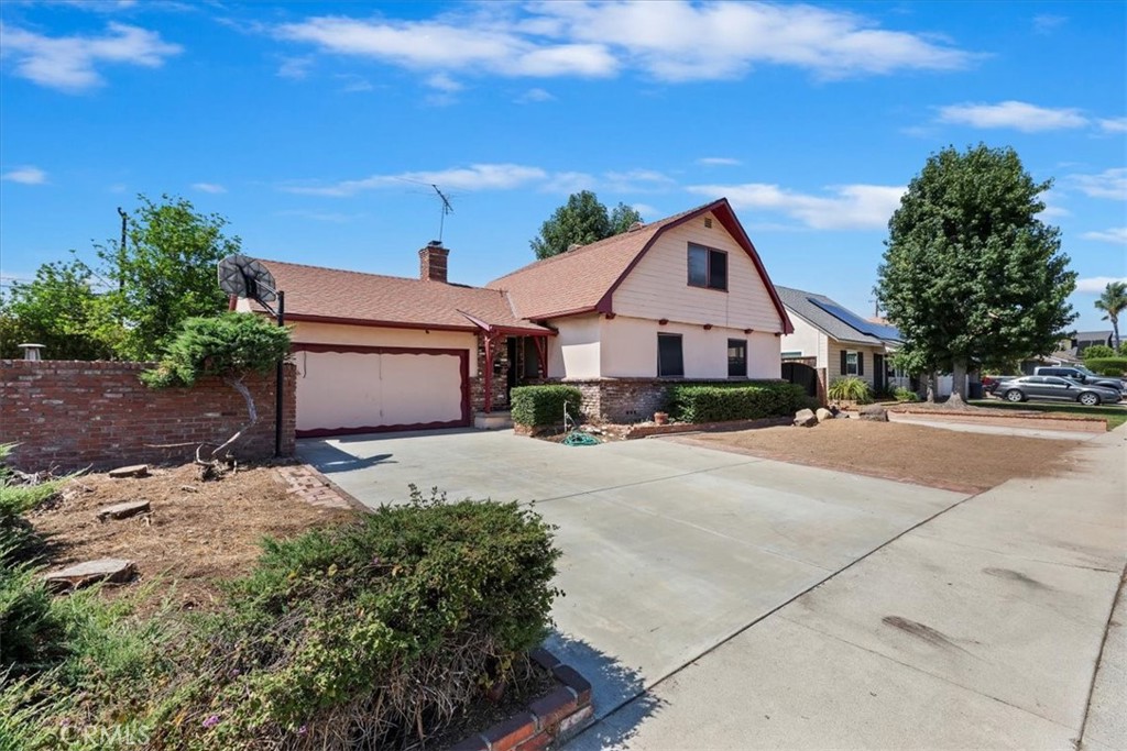 Fabulous Fixer Upper loaded with upside and potential value.. Nestled comfortably in the "Hidden Village" tract of Charter Oak.. Sleeping curb appeal with traditoinal used brick vaneer, planters, and 2 concrete driveways (one on the north is for RV access to the gated concrete RV parking pad in the back and the one on the south is to the 2 car attached garage).. Good sized backyard full of possibiliteis with a huge covered patio, empty pond & water features, block walls, and trimmed in brick planters.. Flexible 2 story floor plan wtih 2 bedrooms up & 2 bedrooms down.. Interior is highlighted with a used brick living room wall, fireplace, & hardwood floors but is in pretty grubby or grimy condition and ready for rehabing.. Golden opportunity for someone who is ready for a fixer upper adventure and obtain some good old fashion sweat equity.. Other perks are the Charter Oak School District with California Distinguished schools, local parks, shopping centers & community colleges nearby..