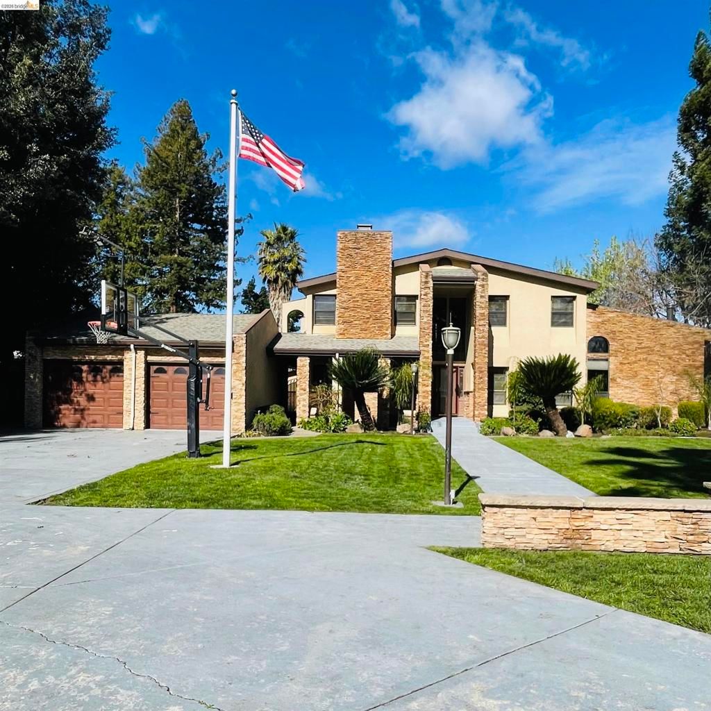 Photo of 3635 3635 Country Club Blvd Blvd, Stockton, CA 95204 (MLS # 41124777)