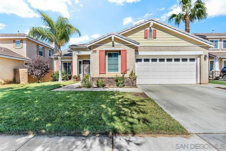 Beautiful Single-Story Craftsman Home in Highly Desirable West Hemet! Welcome to this home located in a quiet, family-friendly neighborhood on Hemet’s sought-after west side. Offering nearly 2,500 square feet of living space, this four-bedroom, two-bathroom home combines comfort, space, and functionality. Step inside to a spacious formal living and dining room that sets the tone for the home’s open and inviting layout. The seamless flow continues into the family room and kitchen — perfect for entertaining or everyday living. The kitchen features granite countertops, ample cabinetry for storage, a convenient built-in desk area ideal for working from home, and plenty of natural light throughout. The primary suite is a true retreat, complete with a walk-in closet, dual sinks, a private restroom, and a separate soaking tub and shower. All bedrooms are generously sized, offering flexibility for family, guests, or a home office. Additional highlights include beautiful tile flooring throughout the main living areas, cozy carpeted bedrooms, and a well-equipped laundry room with a utility sink and extra cabinets, conveniently located off the garage entry. Enjoy the nicely maintained front and back yards, perfect for outdoor gatherings or relaxing evenings. This prime location is just minutes away from Seven Hills Golf Club & Diamond Valley Lake and Marina! Easy access to Domenigoni Parkway and the I-215, with nearby elementary, middle, and high schools — all within the same community. Don’t miss the opportunity to make this beautiful Hemet home yours!