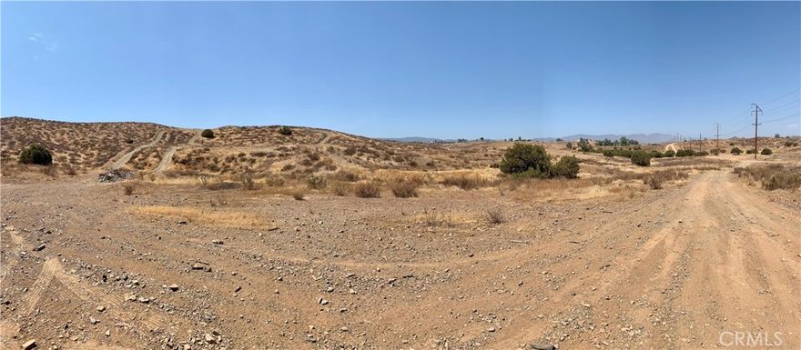 5 acres in the City of Perris. Land is zoned R-R with a variety of uses. Power is at the street. Great opportunity in a developing area. Please call with any questions.