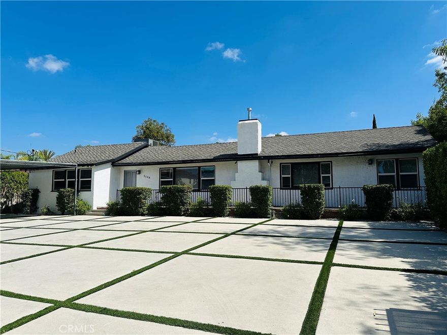 Fabulous Mid-Century Ranch in desirable South of the Blvd. Tarzana Neighborhood.  Refurbished for the fussiest tenant.  New waterproof laminate wood floors throughout, crown moldings, recessed lights, new window blinds, tilled baths with quartz counter tops.  Formal Living room w/cathedral ceilings that opens to the Formal Dining room; both with fireplaces and recessed lights.  The Dining Room adjoins the Kitchen which opens to a huge Family room and sunny Breakfast room.  Kitchen was updated with granite counters, breakfast bar.  New built in 5 burner stove, dishwasher, refrigerator, with lots of counter/storage space, plus 2 separate sinks.   Double sliding doors leading from Family room to patio, play area, and fenced pool with spa it's ideal for entertaining. Newly remodeled Master Bedroom, ensuite Master Bath with Large shower and Stand-alone Tub.  Spacious Walk-in Closet plus a wardrobe closet.  2 auxiliary Bedrooms have private baths and 3rd auxiliary bedroom's bath is close by. Security gated with a circular drive and ample off-street parking for many cars plus a 2-car carport ideal for entertainment or play.  Great neighborhood with markets, shops, restaurants, hiking trails, golf, entertainment, Houses of worship, and Tarzana Hospital close by.