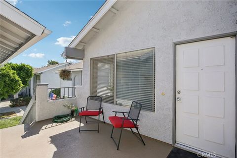 Photo of 9594 Pettswood Dr Dr #4, Huntington Beach, CA 92646 (MLS # PW25191640)