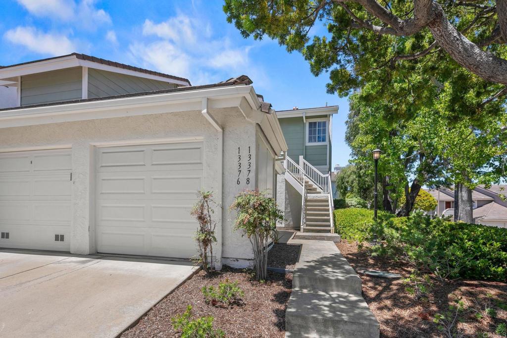 Discover this inviting end unit condo at 13378 Tiverton Road, nestled in the vibrant Carmel Valley area of San Diego. Offering 2 bedrooms and 2 bathrooms across 1,063 square feet, this home features beautiful engineered hardwood floors and an upgraded kitchen with granite countertops and stainless steel appliances. Enjoy modern comforts like recessed lighting, mirrored closet doors, and a private covered patio. The community boasts amenities such as a pool, spa, and tennis courts. With air conditioning, an attached garage, and in-unit laundry, convenience is at your fingertips. Located close to shops, restaurants, and entertainment, this condo offers a perfect blend of comfort and accessibility.
