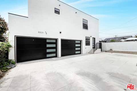 Photo of 3031 1/2 Wellington Road, Los Angeles, CA 90016 (MLS # 26836617)