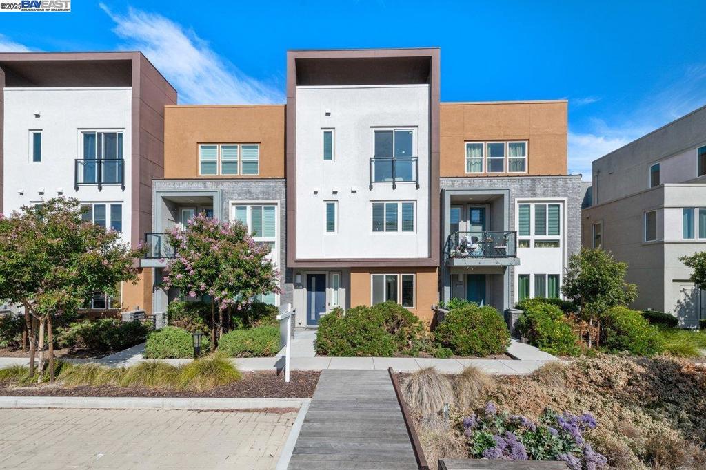 IDEAL East Dublin location! Gorgeous, Like New! 4 PREMIUM size bedrooms, and 4 bathrooms! You will Love the open floor plan with high ceilings showcasing Spacious & bright family/living room, dining area, & balcony deck for outdoors enjoyment! LOADED with upgrades throughout the home including Chic Modern Cabinets, Premium Flooring, and Recessed Lighting! And YES; One Bedroom & One Full Bathroom on the Ground Level. Gourmet 'Wow" kitchen has gorgeous Countertops, and S/S appliances. Luxurious & large Master bedroom features a gorgeous Bathroom & a large Walk-In closet. Secondary bedrooms are spacious as well! Kids Park & great Walking/Running trail nearby. SUPER convenient location, close to TOP Rated Schools! Just steps away from the new Emerald High School. Close to Shopping, Restaurants, Freeways, and BART! Do Not miss this one!