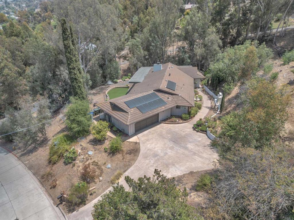 Views, views, and more views! Single-story 3-bed, 2-bath home in Mount Helix offering breathtaking views of the surrounding hills and vibrant sunsets! Situated in a serene, family-friendly neighborhood, this well-maintained residence boasts an expansive 18,000 sqft oversized lot, perfect for outdoor enthusiasts, gardeners, or those envisioning custom expansions like a pool, ADU, or entertainment oasis. Equipped with eco-friendly solar panels, and new HVAC in 2024 this home ensures energy efficiency and lower utility costs. Inside, enjoy a spacious open layout with abundant natural light, and views of nature from every window. Located just minutes from top-rated schools, scenic parks, bustling shopping centers, and major highways, this property offers the perfect blend of tranquility and convenience. Don’t miss this rare opportunity to own a slice of paradise with unmatched views and room to grow.