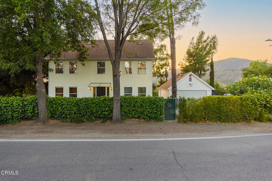 Charming Hillside Retreat with Spectacular Sunset & Mountain Views is ready for your love and care!Perched on a tranquil hillside, this character-filled home offers sweeping views of the Mountains and unforgettable Ojai Valley sunsets. Whether you're sipping coffee on the upper balcony or gardening in the terraced yard below, nature's beauty surrounds you at every turn.This two-story home boasts expansive windows and sliding glass doors that flood the space with natural light and frame stunning vistas throughout the day. The spacious upstairs deck provides a front-row seat to golden-hour skies and serene mountain silhouettes--ideal for evening relaxation or entertaining guests.The property includes multiple structures, including a detached studio and an additional outbuilding with rustic charm--perfect for creative use or future renovation. Mature landscaping, raised garden beds, and vibrant flowering plants bring the outdoor space to life.Just minutes from the heart of Ojai, this property offers privacy, potential, and postcard-worthy scenery. Don't miss your chance to own a slice of paradise with million-dollar views.