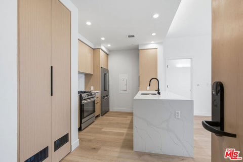 Photo of 3555 Overland Avenue #PH8, Los Angeles, CA 90034 (MLS # 26986079)