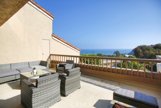 Welcome to this two story pristine home with sweeping ocean views in the heart of central Malibu!! This completely remodeled, expansive home features an open floor plan complete with an entertainers kitchen with stainless steel appliances and custom wood cabinets and quartz countertops, chic breakfast nook with a built in booth, living room with a gorgeous fireplace and dining area. The spacious living room is filled with natural light and highlighted by a wall-to-wall sliding glass door that opens to an oversized balcony with breathtaking ocean views—ideal for relaxing or entertaining guests. Upstairs is the sleeping quarters with 2 bedrooms and a bonus room. The Maison de Ville community amenities include a heated pool and jacuzzi and sauna. Within minutes to Pepperdine, 3rd point overlooking the lagoon, Malibu Beaches, farmers market, and so much more!