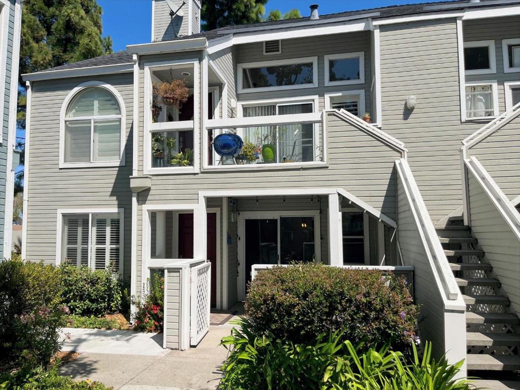 Enjoy living at the beautiful Boardwalk in Redwood Shores. This resort-like community features a private lagoon, lovely landscaping, fountains, pool, and spa. HOA dues $606/mo. 2 Bedroom 2 Bathroom home, beautifully remodeled. This rarely on the market corner, ground floor unit, with front and back patios, faces the quiet greenbelt and open space. Light and airy Living Room with many windows, custom lighting, and laminate tile flooring. Dining Area with custom lighting, plus breakfast bar seating, and sliding glass door to your private Patio. You'll love the custom Kitchen overlooking the Living Room, with granite countertops, glass tile backsplash, cooktop and oven with tailored exhaust fan, double drawer dishwasher, triple door refrigerator, and plenty of cabinets. Perfect for entertaining! Secluded Primary Bedroom with sliding glass door to private patio and Bathroom with double head shower and a stunning custom vanity. Second Bedroom is optimized with a built-in Murphy Bed for guests while also allowing for your home office. Convenient hallway Bathroom. Separate Garage with storage, second reserved parking spot, guest parking available. Close to great schools, shopping, parks, and easy access to 101 freeway. Unit overlooks San Francisco Bay Trail.