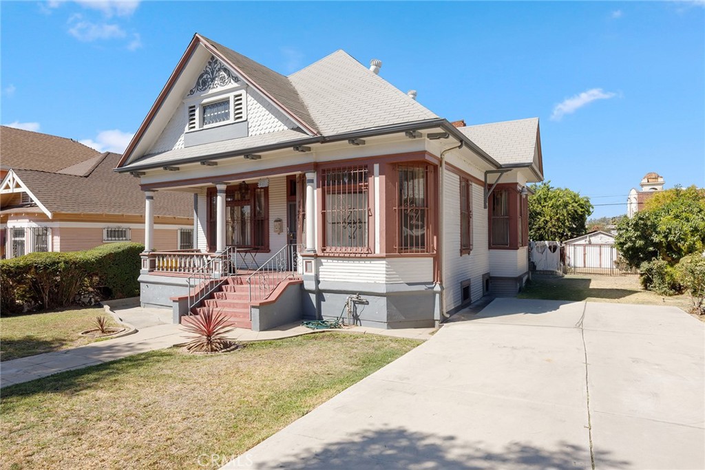 Classic Craftsman Charmer with Expansive Lot & Development Potential in Lincoln Heights! Welcome to this rare find in the heart of Lincoln Heights - where timeless character meets exceptional opportunity. This single-level Craftsman-style home sits on an impressive nearly 10,000 square foot lot (zoned LARD2), offering exciting potential for additional units, an ADU, or a second home. Whether you're drawn to the home’s classic curb appeal or its development upside, this is a property that truly stands out. Step inside to discover nearly 1,700 square feet of well-designed living space with tall ceilings and vintage detailing throughout. The living room and family room create versatile spaces for relaxation and entertaining, while a bonus room offers flexibility for a home office, creative studio, or potential fourth bedroom. The generously sized kitchen is a standout feature, equipped with a 5-burner gas range, range hood, and an oversized walk-in pantry. The enclosed rear porch includes a utility sink and extra room for laundry or storage. Additional highlights include a cozy fireplace, ceiling fans for comfort, and a large covered front porch perfect for enjoying the neighborhood’s historic charm. A massive unfinished basement provides ample space for storage, a workshop, or future expansion. Outdoors, the property continues to impress with mature orange and persimmon trees, a detached garage, a backyard storage enclosure, and an extra-long driveway with RV access and generous parking capacity. Ideally located near Downtown Los Angeles, Elysian Park, the Arts District, Dodger Stadium, Chinatown, public transportation, and a vibrant mix of restaurants and shops - this home combines convenience with charm and opportunity. Don't miss your chance to own a piece of LA history with room to grow - both inside and out!