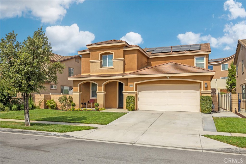 Welcome to Rosena Ranch, where this spacious two-story home offers 2,690 square feet of well-designed living with sweeping mountain views. The kitchen features granite counters, a large center island, and connects seamlessly to the open living and family areas. A main-floor bedroom with full bath adds flexibility for guests or multigenerational living.
Upstairs, the primary suite includes a walk-in closet and private bath, along with two secondary bedrooms, a versatile loft, and a laundry room with built-in storage. Ceiling fans throughout the home provide added comfort and efficiency.
The landscaped backyard is ideal for both relaxing and entertaining, complete with a covered paved patio, three ceiling fans, and a storage shed. Refrigerator, washer, and dryer are included, and the solar system helps reduce monthly energy costs.
Rosena Ranch residents enjoy exclusive access to a clubhouse, pool, spa, fitness center, and playgrounds, all surrounded by rolling hills and natural scenery. With close proximity to the I-15, Glen Helen Regional Park, and San Manuel Amphitheatre, this home offers both comfort and convenience in a desirable community.
