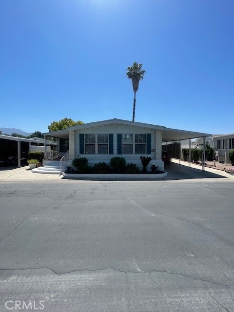 Discover the potential of this delightful 2-bedroom, 2-bathroom home nestled in a desirable 55+ community. This spacious home offers 1946 square foot of living space providing a perfect canvas for those looking to infuse their personal style through cosmetic updates. This home features a large living area, large formal living area, spacious bedrooms with a large walk-in closet, New AC/Furance. The kitchen, with plenty of cabinet space, is ready for a refresh to become the focal point of the home, but does include a new stove top. Located across the street you will find the popular Soboba Casino, championship golf course and plenty of restaurants to choose from. Join in on the fun activities and events sponsored by the resident’s association. This property is a fantastic opportunity for those looking to customize their next home in a supportive and active senior community.