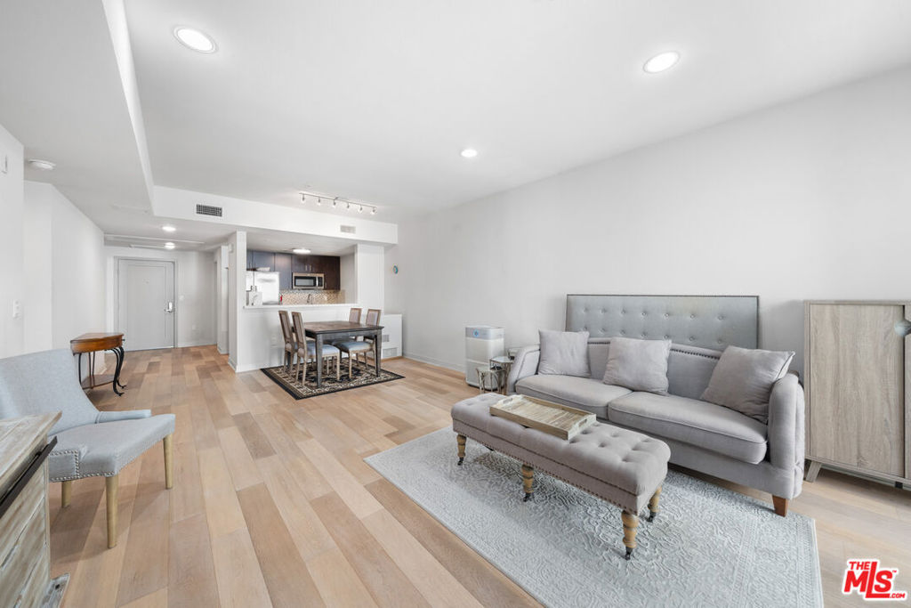 Welcome to Element 436, a beautifully appointed 2-bedroom, 2-bath residence located on the fifth floor of The Element building, in the heart of Koreatown. This thoughtfully designed unit features engineered hardwood flooring, recessed lighting, and large windows that flood the space with natural light. The sleek kitchen is perfect for cooking and entertaining, featuring polished Quartz countertops, a custom glass and natural stone backsplash, modern cabinetry, and Frigidaire stainless steel appliances, including a refrigerator and oven/range. The spacious primary suite offers a walk-in closet and en-suite bath, while the second bedroom is ideal for guests or a home office. A dedicated in-unit laundry room with an LG washer and Whirlpool dryer adds everyday convenience. Residents enjoy two assigned parking spaces and bicycle storage in a gated garage. Community amenities include a fitness center with cardio, boxing, and yoga zones, a landscaped courtyard with lounge seating, a community BBQ area, and a dog walk for pet owners. Located just minutes from Downtown LA, Larchmont Village, the Metro, and Koreatown's best restaurants, bars, cafes, and shopping, this home offers the perfect combination of style, comfort, and convenience in one of LA's most dynamic neighborhoods.