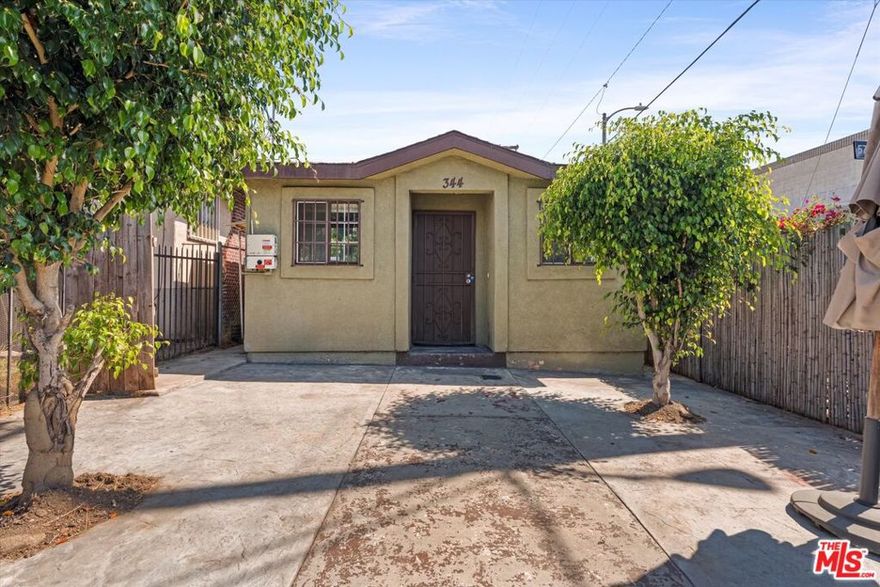 Situated just blocks away from the vibrant heart of DTLA, this versatile and remodeled property offers a unique opportunity that caters perfectly to investors, large families, or first-time homebuyers! Currently configured as two separate units (which can be easily combined back into one), this charming single-family home also includes a remodeled trailer in the backyard. All three units provide great rental income. The gated front yard boasts a welcoming front courtyard, providing a peaceful retreat amidst the urban setting. The first unit features 3 bedrooms and 1 bath, ideal for families seeking comfort and space. Beautiful flooring throughout adds warmth and elegance to the living spaces. The kitchen boast great natural light and features everything you need! Other conveniences include a hallway closet with shelving and washer dryer hook ups. The second unit offers a remodeled 1-bedroom unit with ample space, perfect for individuals or couples looking for a comfortable living space. Like the other unit, it also comes fully equipped with essential appliances and beautiful flooring, creating a seamless blend of functionality and style. In the backyard is a remodeled trailer, which has been used as an Airbnb as well as a long term rental. With its prime location, versatile units, and thoughtful amenities, this property presents a fantastic opportunity for investors or those looking to live in one unit while renting out the others. Don t miss out on the chance to make this property your own!