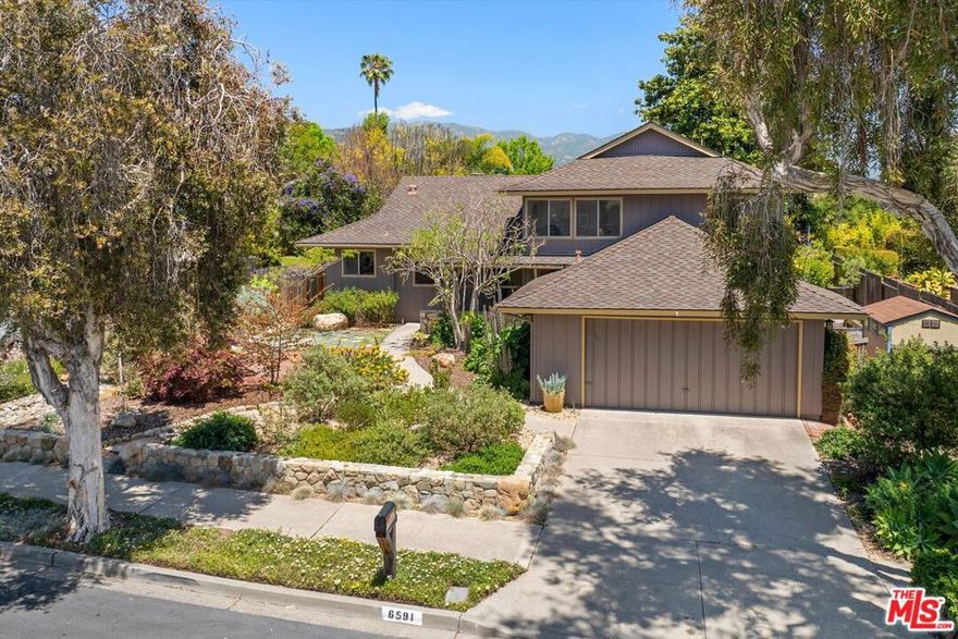 This spacious 5-bedroom, 3-bathroom home offers over 2,300 square feet of comfortable living in the heart of Goleta's desirable Lake Los Carneros neighborhood. Owned by the same family since it was built, this well-maintained home features recent upgrades including two remodeled bathrooms, new flooring, and fresh paint. Other areas present an opportunity for new owners to add their personal touch. The beautifully landscaped front and back yards feature mature trees and colorful native plants, creating a peaceful outdoor retreat with mountain views - perfect for relaxing, gardening, or entertaining. Enjoy easy access to scenic walking trails and the natural beauty of Lake Los Carneros, as well as leisurely strolls through nearby Stow Grove Park or a refreshing swim at the neighborhood swim club. With popular shops, restaurants, and Goleta Beach just minutes away, this home truly embodies the laid-back charm of the Goodland lifestyle. It is also located within the La Patera School District.