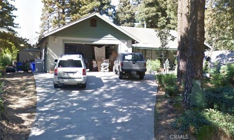 Photo of 22070 BIG OAK RD Rd, Cedarpines Park, CA 92322 (MLS # DW26063835)