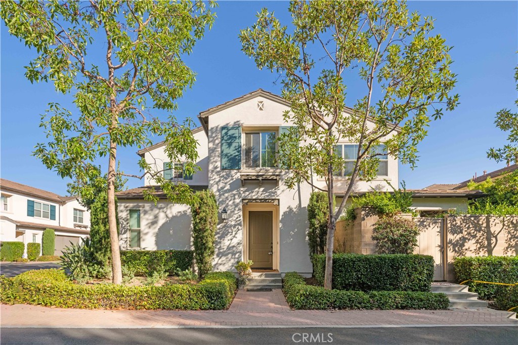 This beautifully upgraded corner-lot home in Stonegate East offers 4 bedrooms and 3 bathrooms across 1,956 sq. ft. of living space. With no neighbors above or below, the two-story layout combines privacy with modern comfort. The gourmet kitchen features granite countertops, shaker cabinetry with a showcase cabinet, stainless steel appliances, a butler’s pantry, and a spacious island that flows into the dining area. Wide-plank hardwood floors, crown molding, recessed lighting, and built-in surround sound speakers highlight the main living spaces, while new energy-efficient windows and motorized shades add convenience and style. Upstairs, the primary suite includes high ceilings and a spa-inspired bath with a soaking tub, walk-in shower, and dual sinks. Three additional bedrooms and two upgraded bathrooms provide ample flexibility, and the private backyard with covered patio and gas hookup is perfect for outdoor entertaining. Located within walking distance to Woodbury Town Center and Crean Lutheran High School, and part of the award-winning Irvine Unified School District, this home also offers easy access to resort-style community amenities, parks, freeways, and popular destinations including Irvine Spectrum, Great Park, and Disneyland.